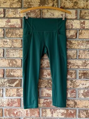 Athleta Salutation Side Stash High Rise Leggings Women’s Size Medium Excellent!